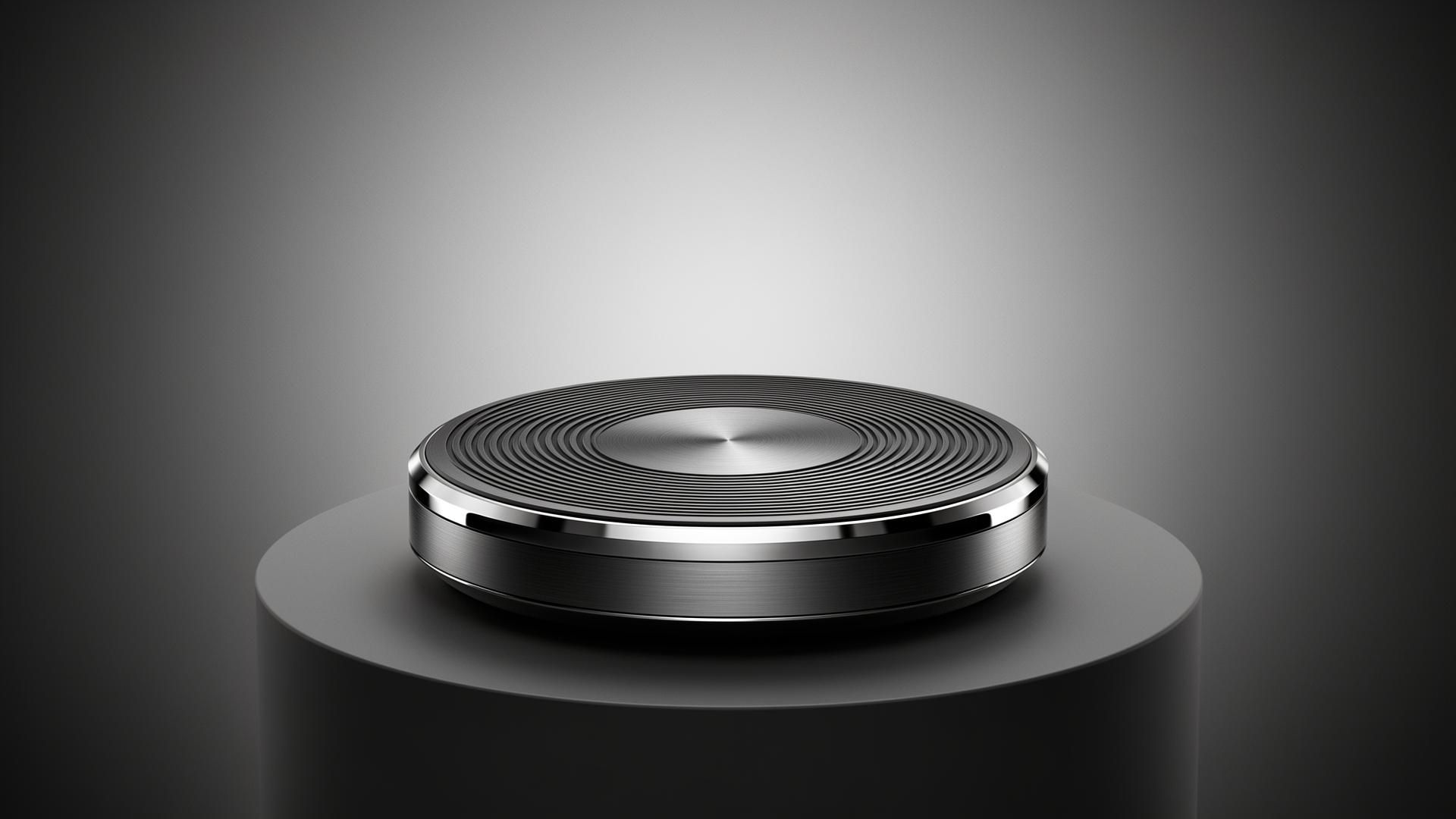 Polished metallic disc on a charcoal stage